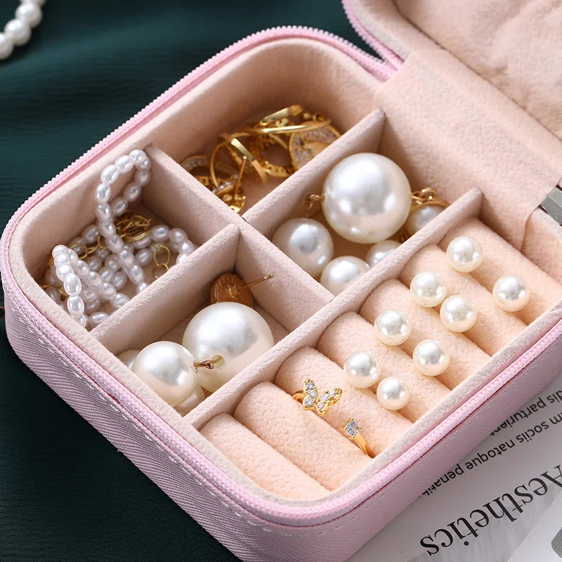 boîte bijoux simili cuir vert pastel moderne fermeture glissière blanc rose pâle boucles doreilles