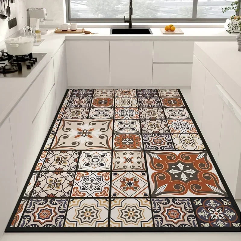 Un sol de cuisine avec des motifs géométriques colorés et élégants, créant une atmosphère chaleureuse et accueillante dans cette pièce.