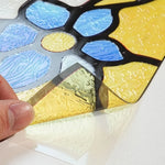 film vitrail adhésif art déco motifs floraux géométriques couleurs vives opaques fenêtre