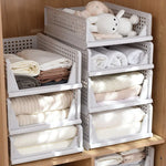 paniers rangement blancs perforés empilables respectueux environnement moderne fournis clips armoire vêtements pliés