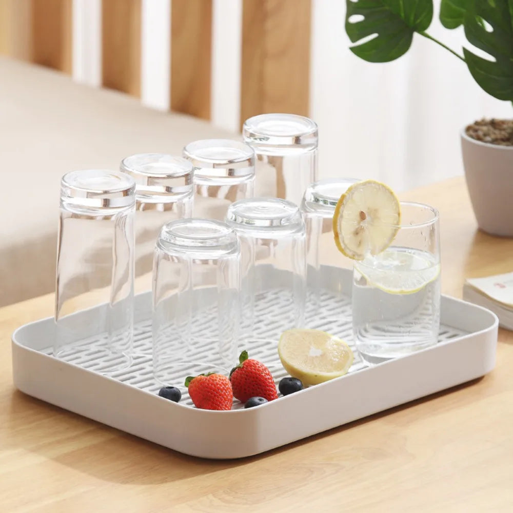 plateau rangement blanc moderne grille perforations tasse thé théière fruits tapis sol écologique