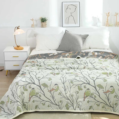 Jeté de lit japonais en gaze de coton 100% avec motif fleuri sur canapé