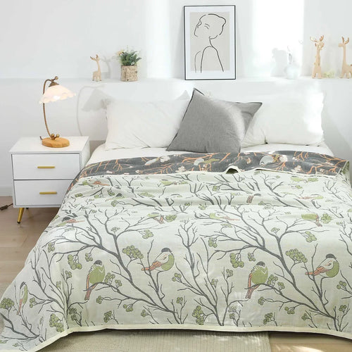 Jeté de lit japonais en gaze de coton 100% avec motif fleuri sur canapé