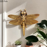 décoration murale statuette libellule dorée texture reptile réaliste moderne salon chambre