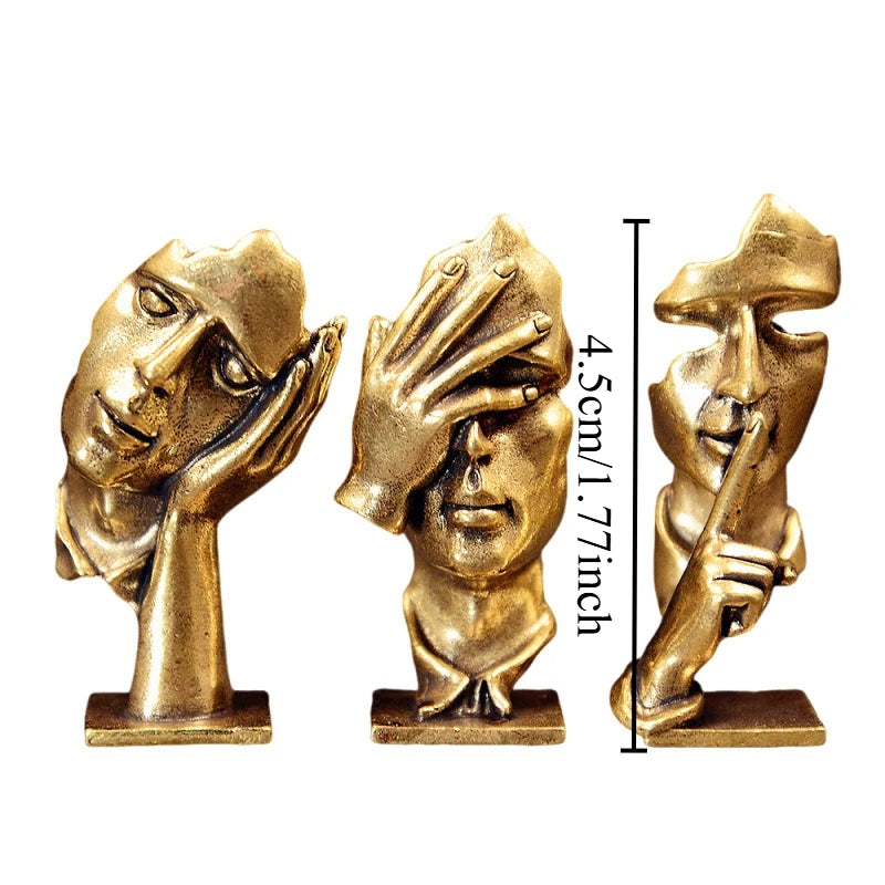 statuette abstraite dorée sculpture visage stylisé moderne décoration salon maison