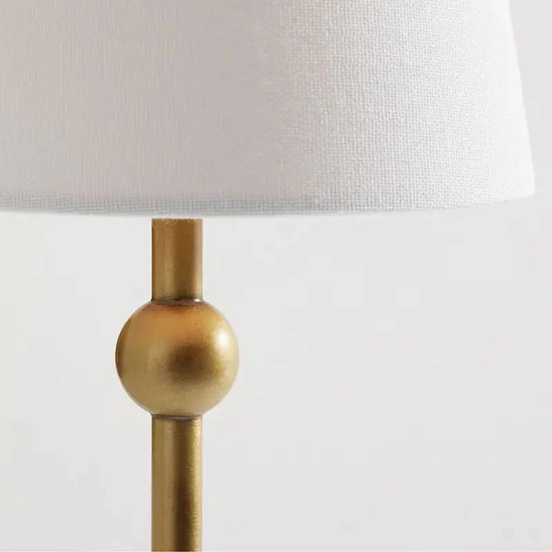 Éclairage doux diffusé par l'applique murale en lin
