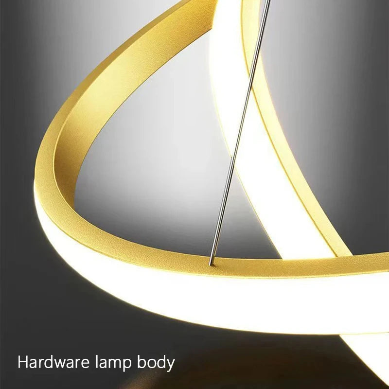 suspension lumineuse moderne or blanc anneaux superposés intérieur chambre salon