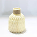 vase décoratif moderne rose fleurs artificielles corde tressée ondulé minimaliste