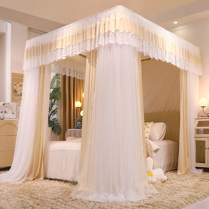 Cette image montre un lit avec un baldaquin blanc élégant et frangé, créant une ambiance romantique et apaisante dans la chambre.