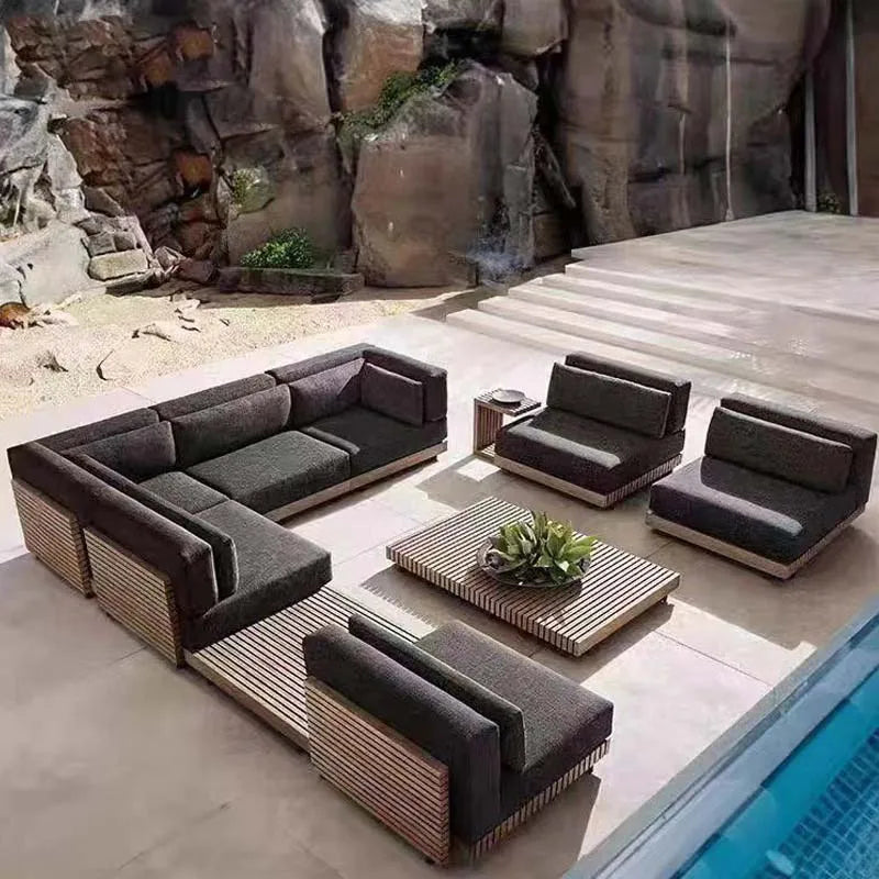 canapé extérieur modulable gris foncé tissu bois naturel coussins pieds noirs moderne minimaliste