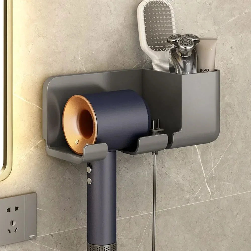 séchoir cheveux moderne adhésif mural noir doré brosse rasoir crème ciseaux tablette smartphone