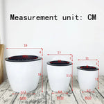 pots plantes modernes blancs noirs grille drainage mur hydroponique