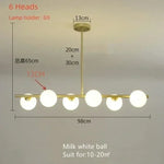 suspension lumineuse moderne têtes boules verre blanc mat noir doré