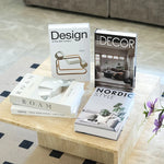 décoration intérieure livres faux blanc gris moderne minimaliste feuilles table étagère