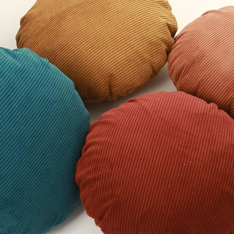 housse coussin ronde velours côtelé rayures horizontales décoration canapé salon moderne rose pâle