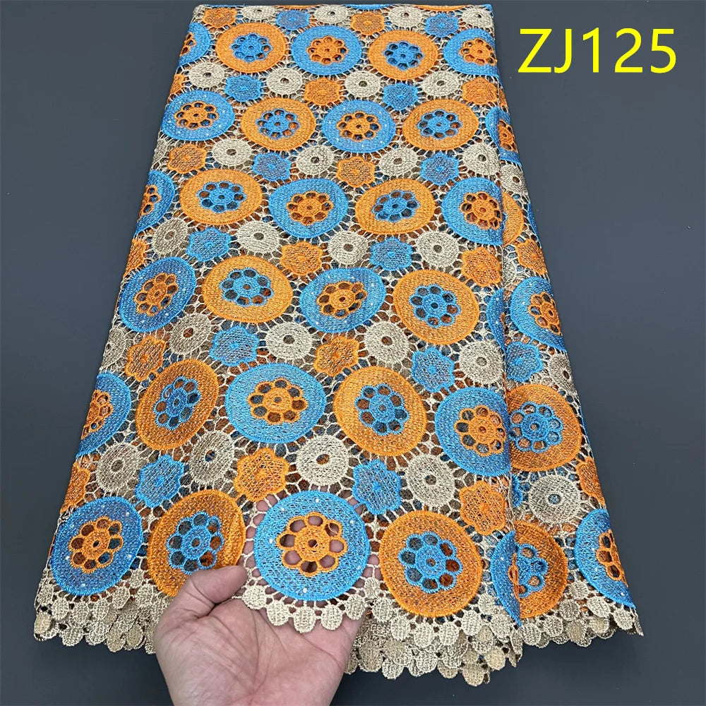 tissu dentelle guipure brodé paillettes fleurs géométriques couture robe haute qualité orange bleu