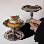 support dessert argenté élégant détails sculptés classique fruits légumes photo accessoire
