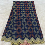 tissu brodé coton blanc doré noir vert bleu rose marron motif géométrique résistance déchirure