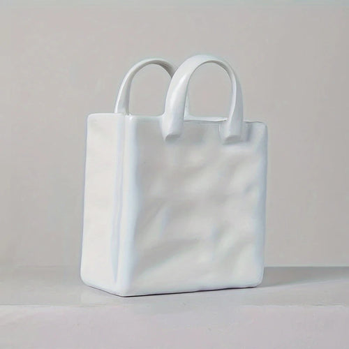 vase blanc moderne forme sac main texture tissu froissé décoration intérieure arrangement fleurs séchées
