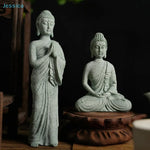 statues bouddha vert clair texture marbre classique décoration intérieure zen espace spiritualité pierre socle