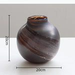vase rond verre peint marron beige orange rouge vert motifs abstraits rayures translucide tableDecoration