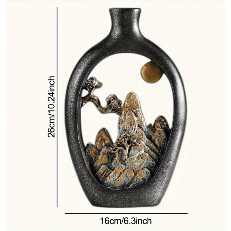vase decoratif noir paysage montagneux relief texture mate eucalyptus branches fleurs minimalistes