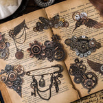 accessoires decoratifs steampunk engrenages roues dentees fleurs papillons bronze noir blanc