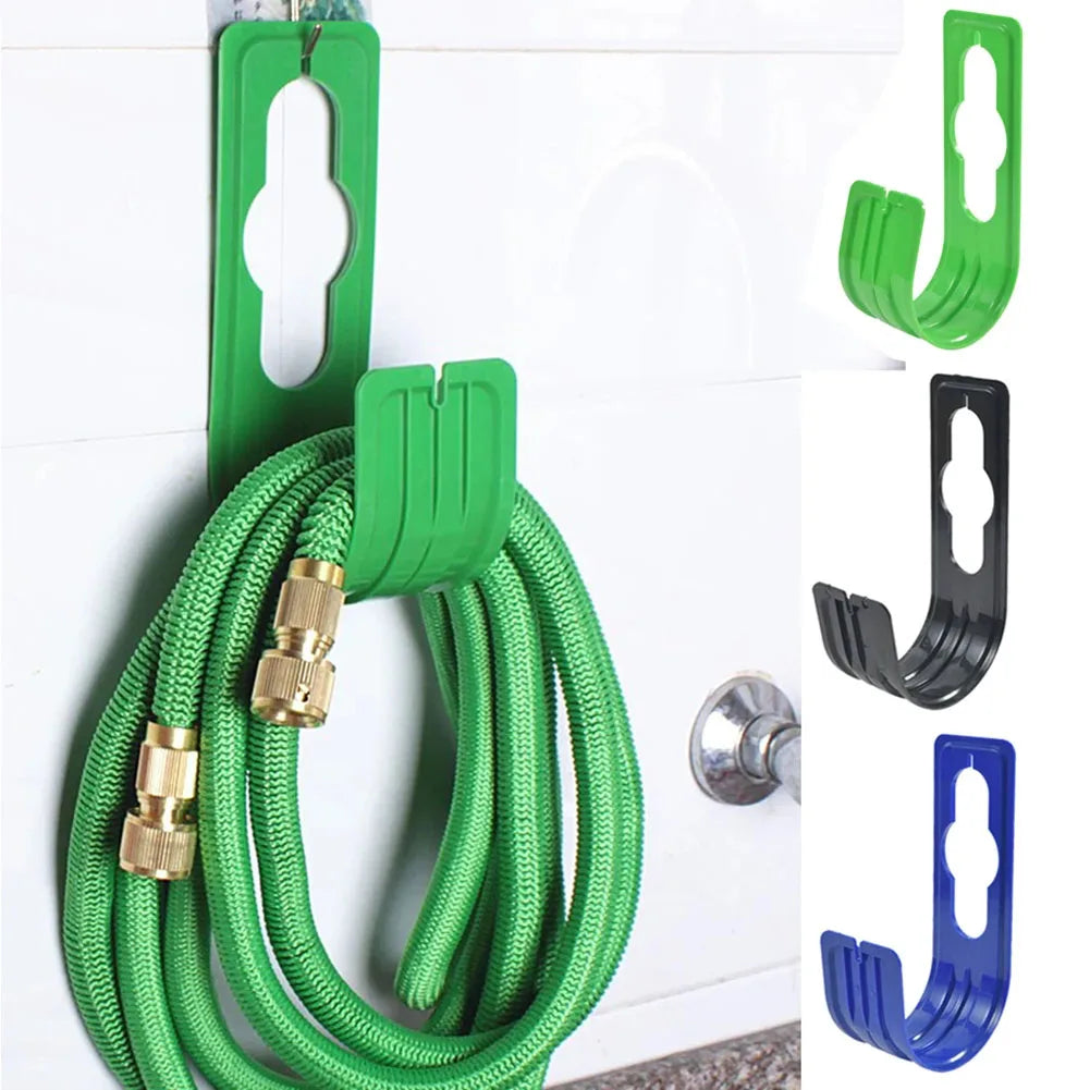 enrouleur tuyau arrosage adhésif utilitaire vert bleu noir minimaliste fixations vis clous flexible