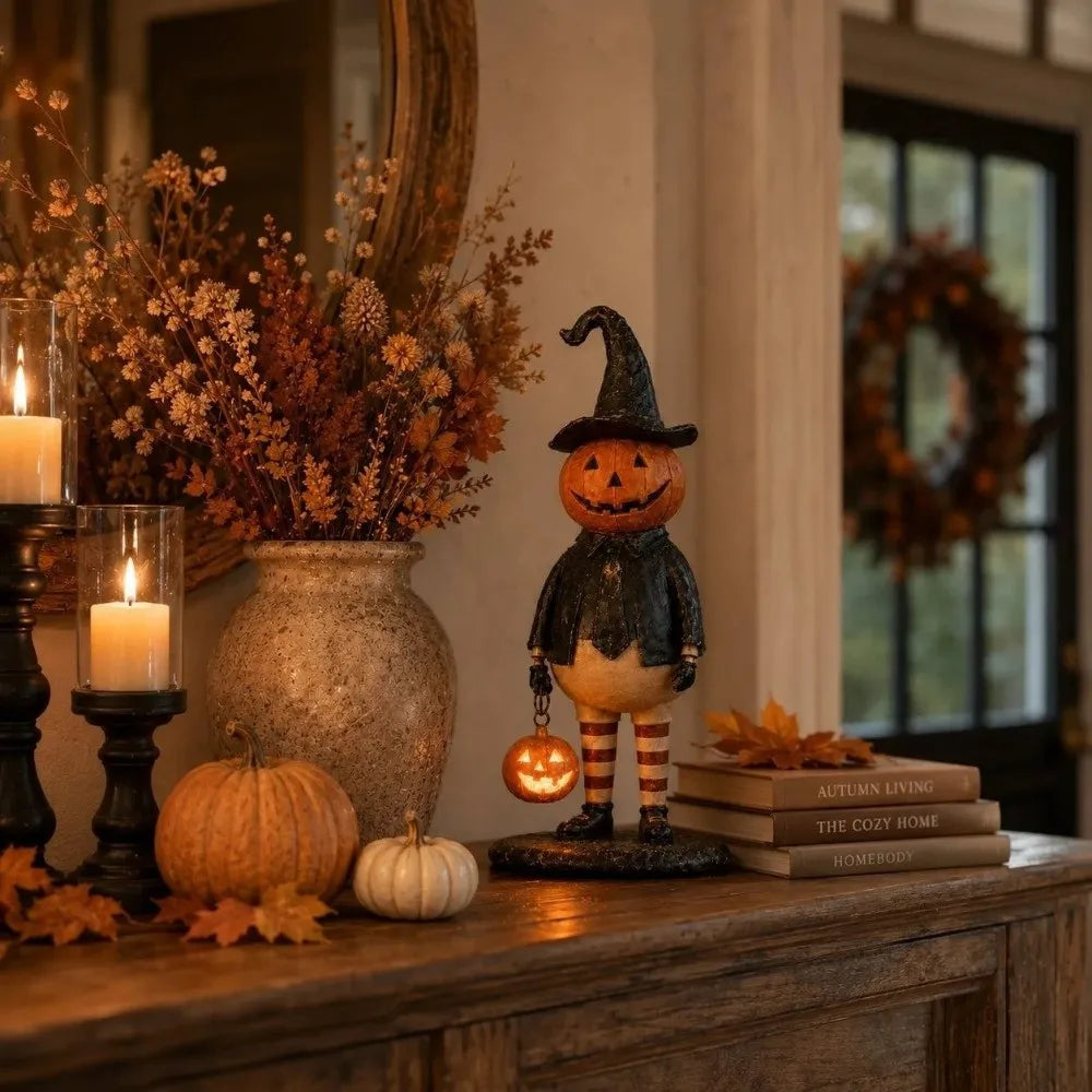 figurine halloween citrouille orange visage chapeau robe bas suspendue noire