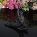 ornements deco moderne figurines yoga noires differentes poses minimaliste sculptural