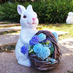 Statues lapins décoratifs fleurs artificielles blanc rose bleu texture fourrure