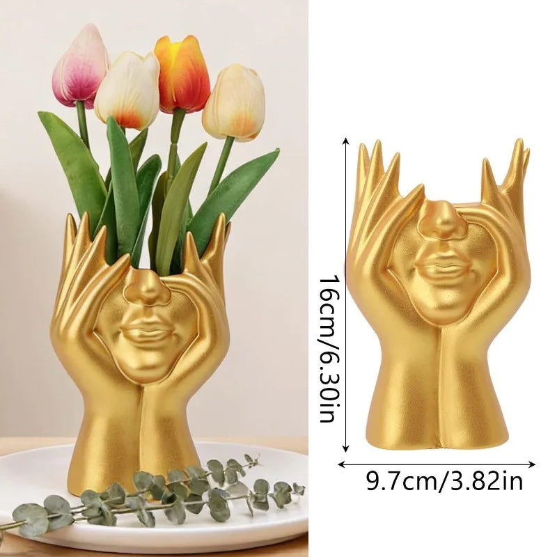 support pinceaux maquillage or argent noir visage stylisé moderne sculpturaliaux pinceaux