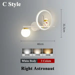 applique murale moderne astronaute étoile dorée noir blanc led chambre enfants