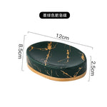ensemble vaisselle salle bain marbre doré moderne vert foncé blanc noir respectueux environnement