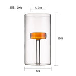 bougeoir moderne verre transparent orange pied simple décoration intérieure bougie