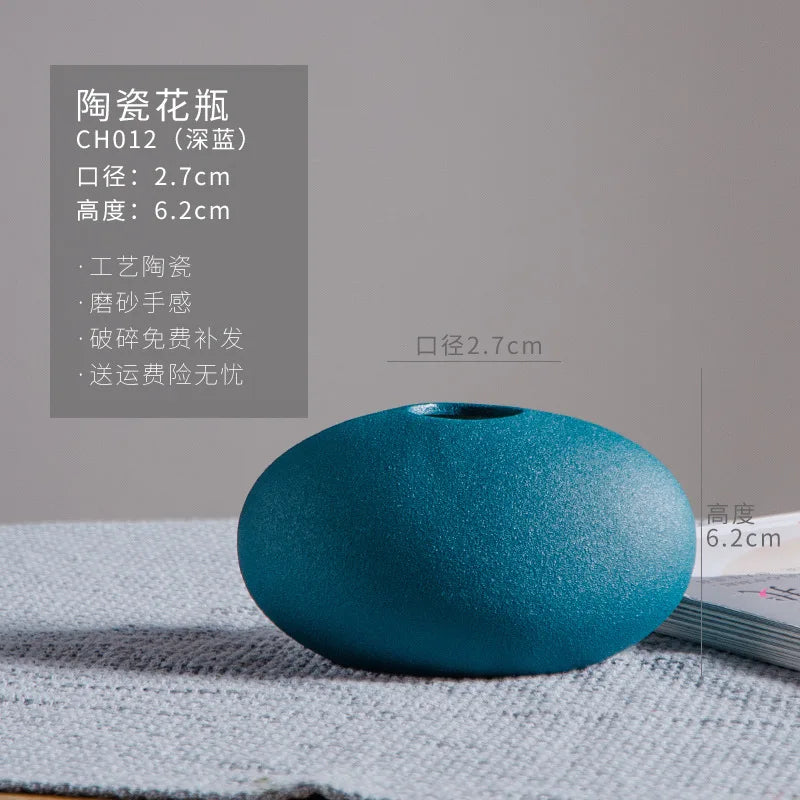 Vase en céramique turquoise de forme elliptique avec des informations détaillées sur ses dimensions et ses caractéristiques.