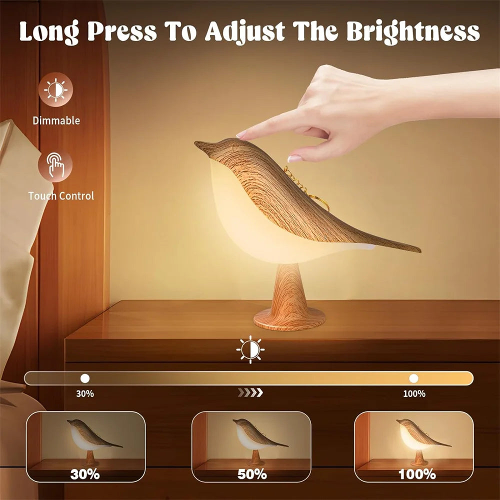 Lampe oiseau tactile allumée en mode lumière chaude
