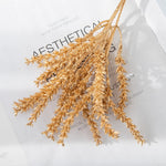 décoration intérieure bouquet feuilles artificielles naturel minimaliste beige gris doré