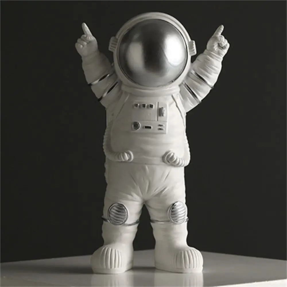 figurines astronautes statuettes lune détails métalliques blanc doré gris moderne