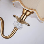applique murale deux lumières or décor floréal abat jour tissu texturé classique fixée mur