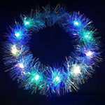 couronne lumineuse festive tissus brillants couleurs vives bleu rose violet lumineux tinsel opaque festive