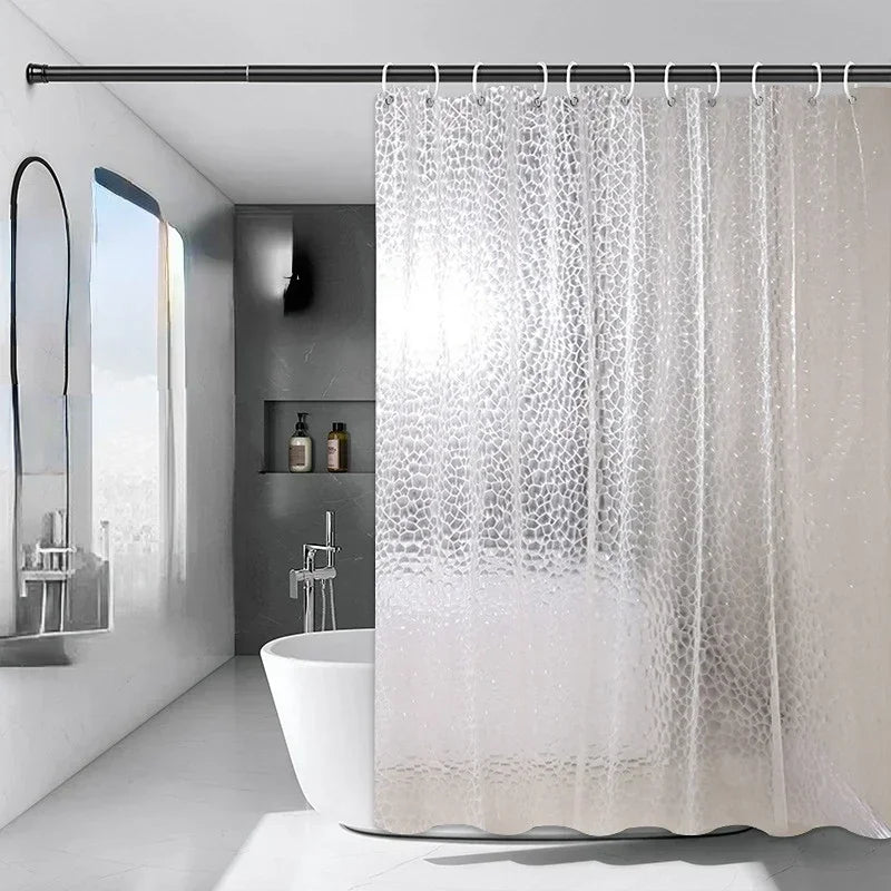 Détail du motif en galets sur le rideau de douche