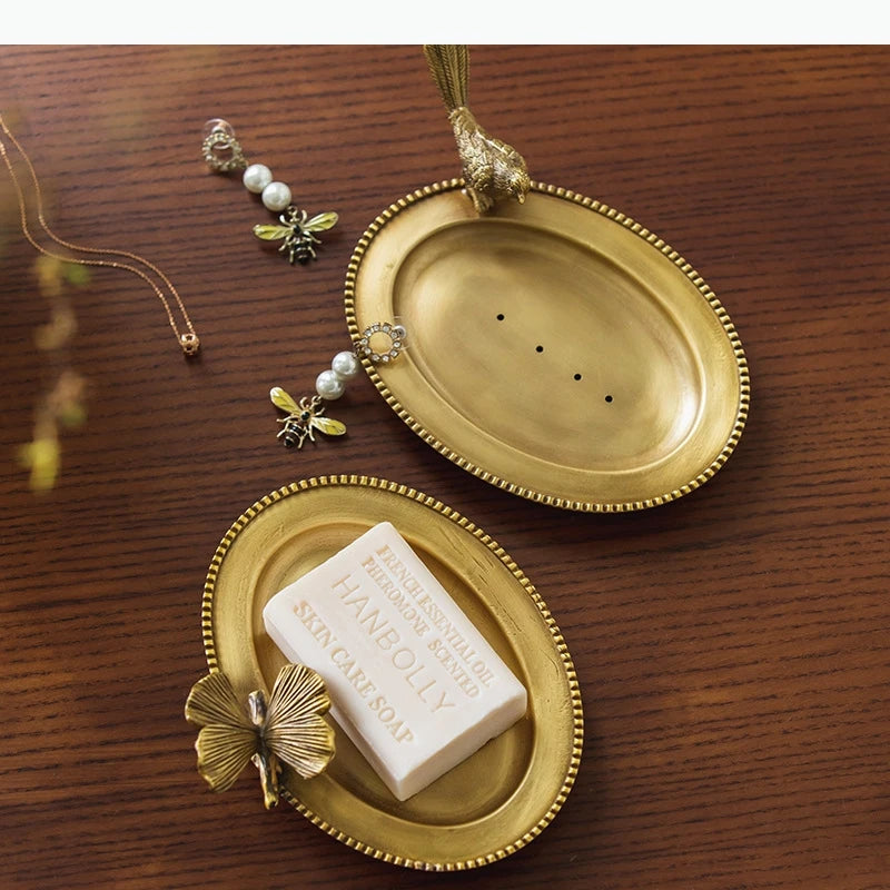 assiette ovale dorée bord dentelé motif oiseau fleur vintage bijoux savon bougie porte bijoux