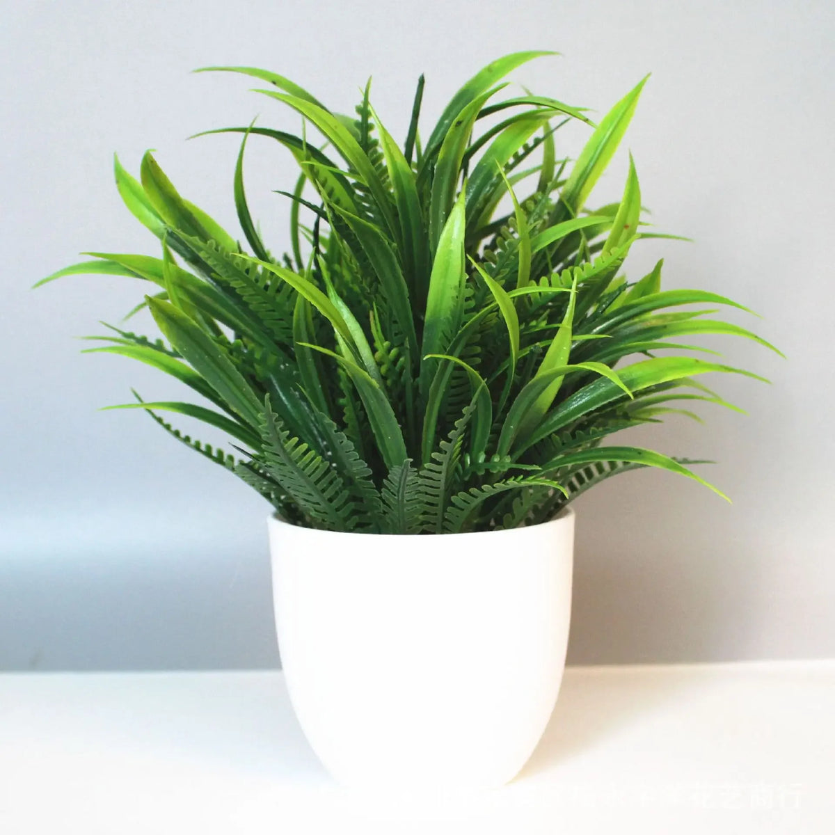plantes artificielles vertes modernes décoration intérieure extérieure pot blanc feuilles fines exposition ordinateur