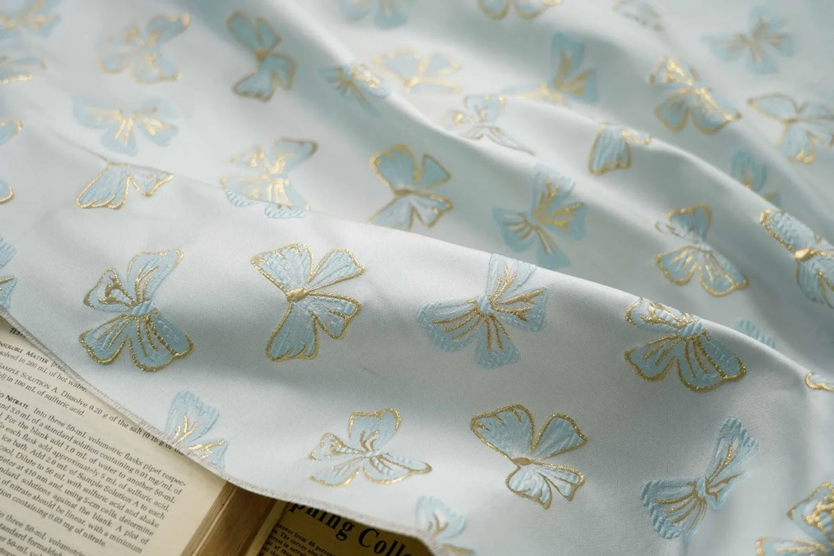 tissu polyester rose clair papillons doré noir moderne élégant coudre bricolage respectueux environnement Jacquard