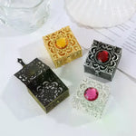 boîte bijoux or argent rouge élégante ajourée motifs floraux vintage cadenas raffiné
