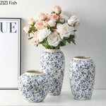 vase classique porcelaine fleurs blanc rouge bleu vert marron decoration table floral