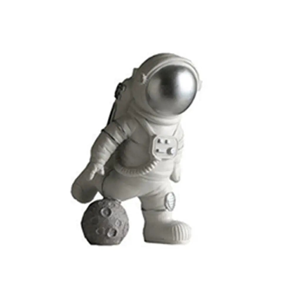 figurines astronautes statuettes lune détails métalliques blanc doré gris moderne