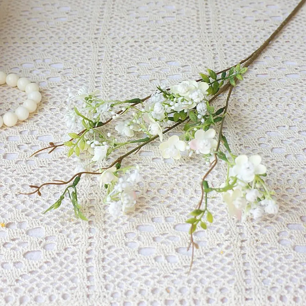 décoration intérieure fleurs artificielles soie rose blanc jaune vert branches feuilles vases transparents printemps