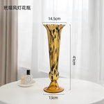 vase verre ambré motif moucheté moderne décoration intérieure bougie papillon fleurs violettes chandelier